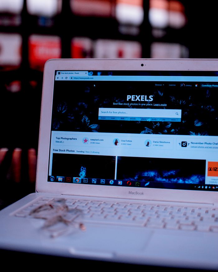 Mastering the First Impression: Your intriguing post title goes here Laptop on a desk showing the Pexels homepage, highlighting its web interface.