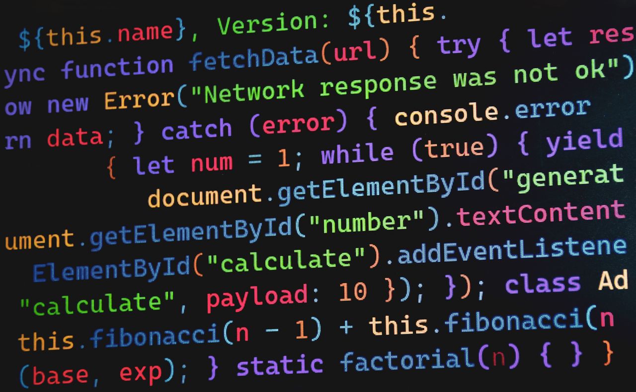gallery-03 Vibrant JavaScript code displayed on a screen, highlighting programming concepts and software development.